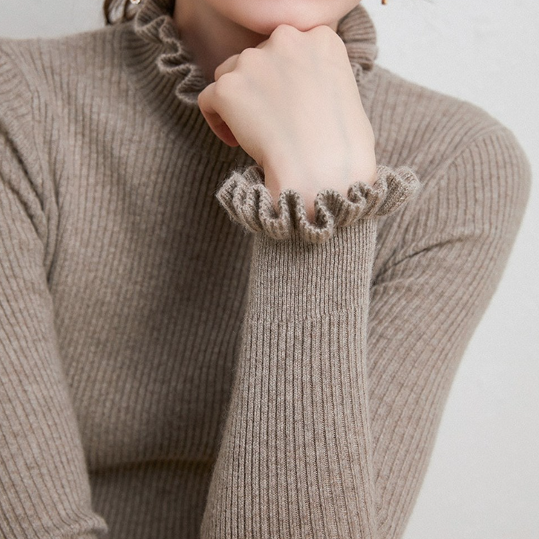 Jersey de cuello alto femenino con delicado diseño de encaje en el cuello y las mangas