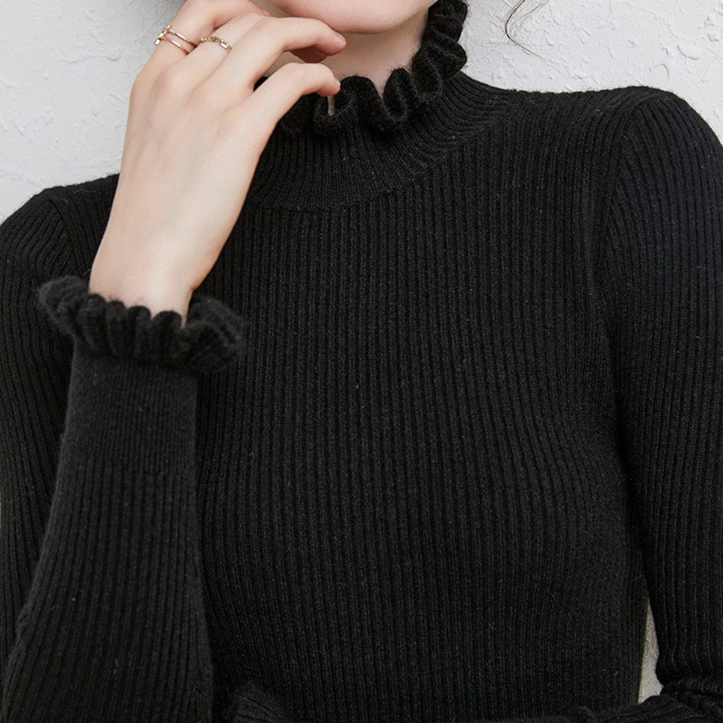 Jersey de cuello alto femenino con delicado diseño de encaje en el cuello y las mangas