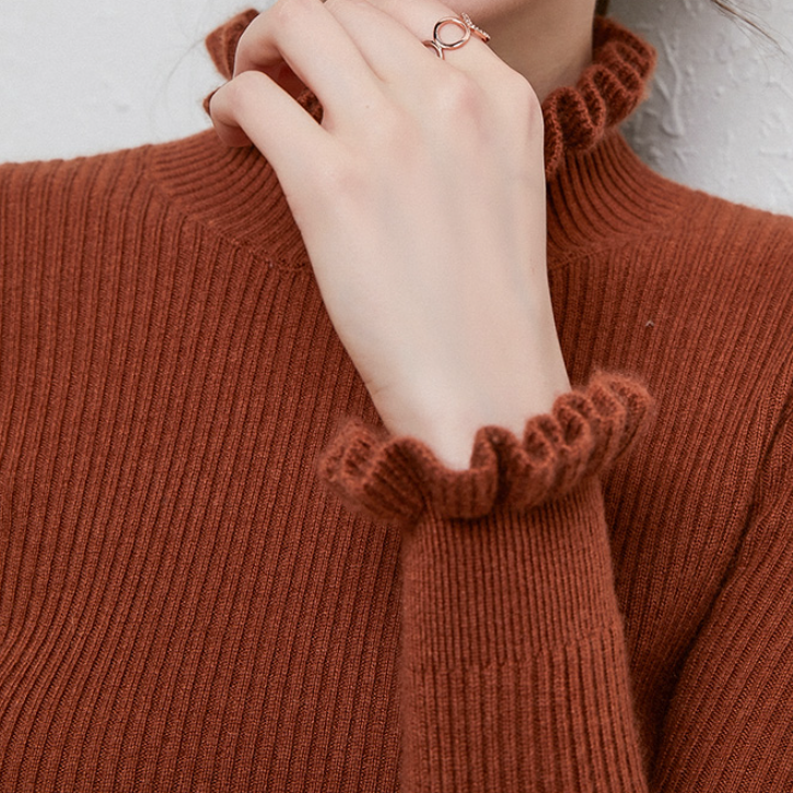 Jersey de cuello alto femenino con delicado diseño de encaje en el cuello y las mangas