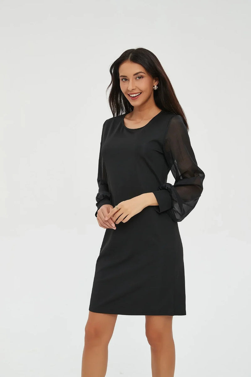Vestido elegante para mujer con detalles de mangas translúcidas