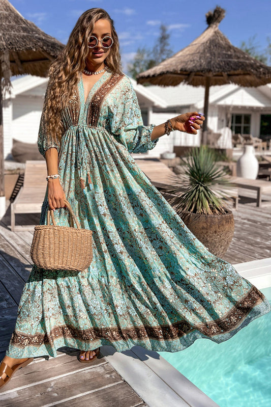 Vestido maxi estilo boho con estampado floral, lazada y diseño de espalda abierta